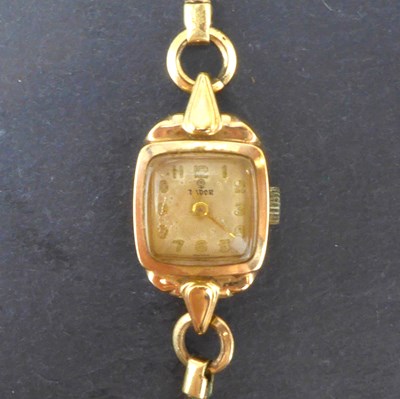 Lot 1420 - TUDOR; a ladies' 9ct gold wristwatch, square...