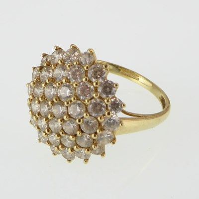 Lot 1097 - A 14ct gold ring with dome-shaped white stone...