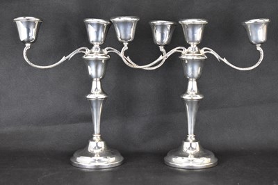 Lot 852 - A pair of Elizabeth II hallmarked silver three-...