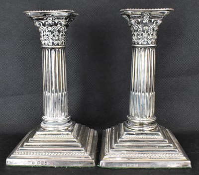 Lot 850 - A pair of George V hallmarked silver loaded...