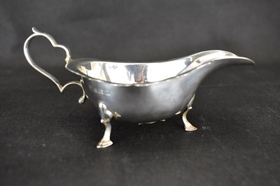 Lot 911 - An Elizabeth II hallmarked silver small sauce...