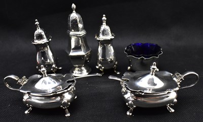 Lot 914 - A hallmarked silver matched four-piece cruet...