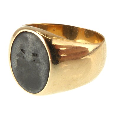 Lot 1022 - A rose gold signet ring with bezel set lead...