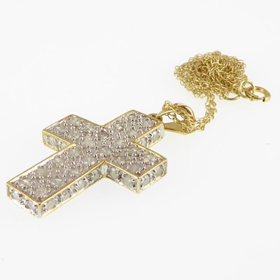 Lot 1219 - A 9ct gold cross pendant with cluster of white...