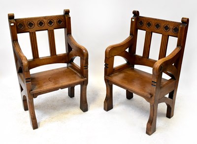 Lot 46 - A pair of ecclesiastical oak thrones with...