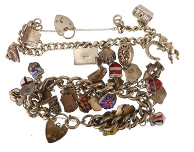 Lot 1189 - Two hallmarked silver charm bracelets, with...
