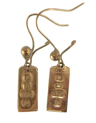 Lot 1273 - A pair of 9ct gold earrings in the form of...