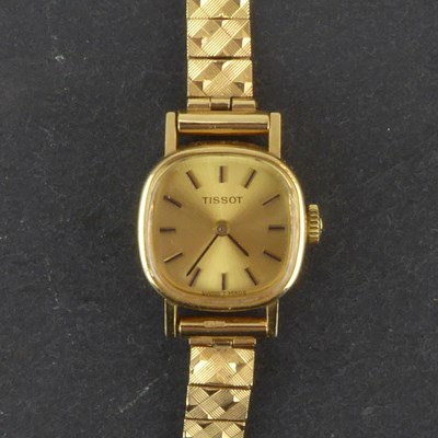 Lot 1417 - TISSOT; a ladies' 9ct gold crown wind...