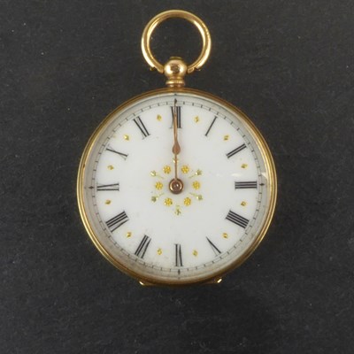 Lot 1382 - A small vintage 14ct gold open face key wind...