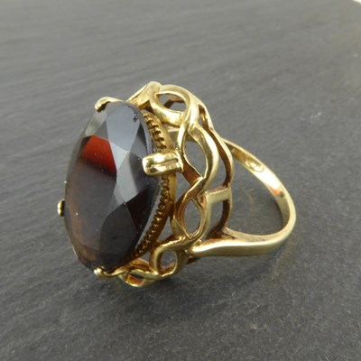 Lot 1130 - A 9ct gold smoky quartz dress ring, size N/O,...