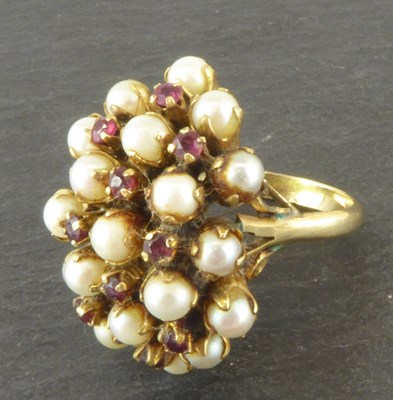 Lot 1096 - A 14ct gold pearl and ruby cluster ring, size...