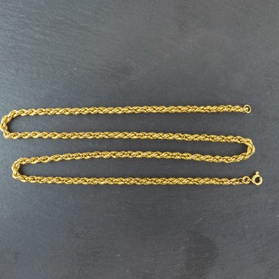 Lot 1249 - A 9ct gold rope twist necklace with hoop clasp,...