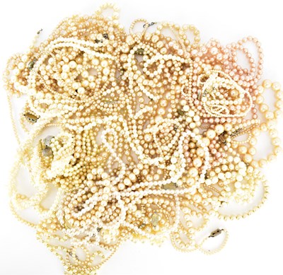Lot 1339 - Thirty-four simulated pearl necklaces, some...