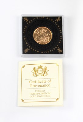 Lot 973 - An Elizabeth II proof sovereign 2015, with...