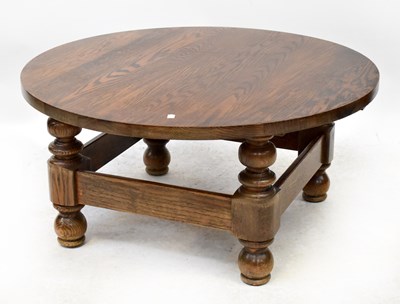 Lot 101 - A contemporary oak circular coffee table...