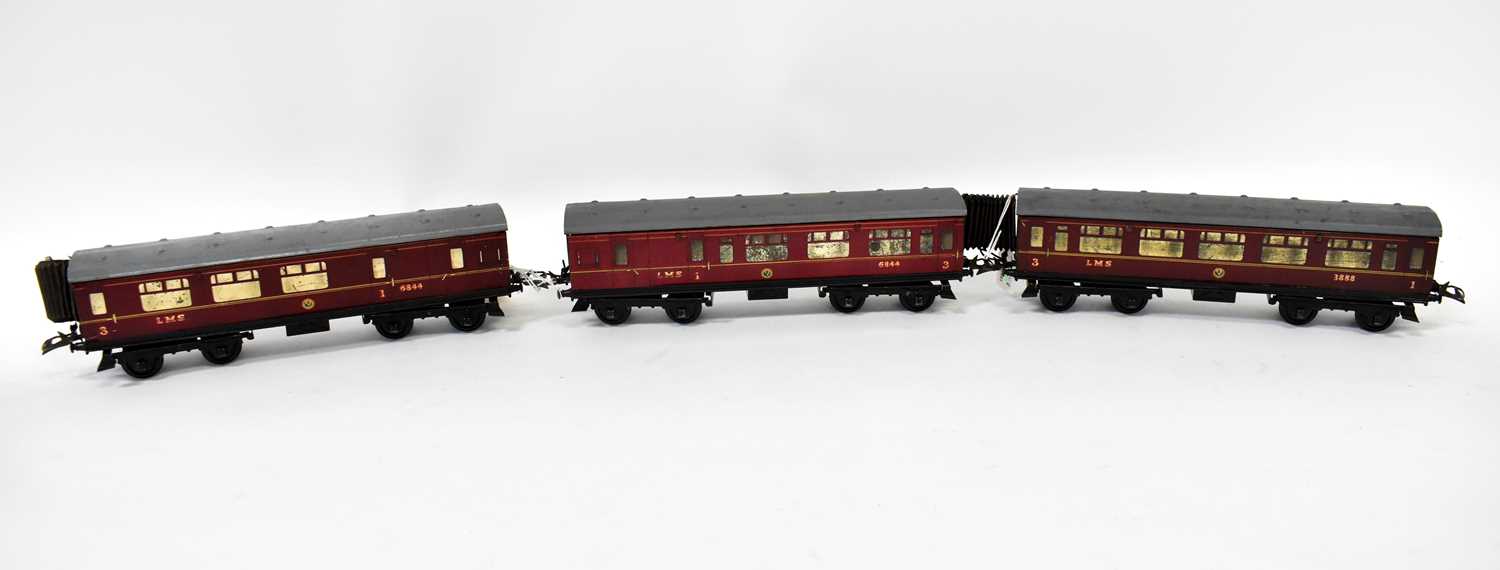 Lot 384 - HORNBY; three LMS carriages, No. 3888, 6844,...