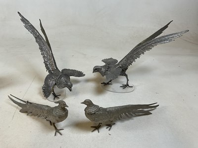 Lot 32 - Two pairs of vintage white metal bird studies...