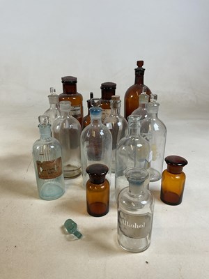 Lot 33 - A collection of apothecary bottles, tallest 31cm