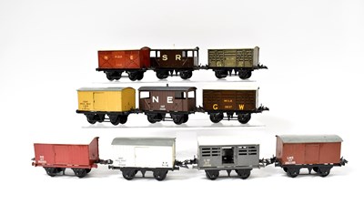Lot 396 - HORNBY; ten O gauge vans including GW milk van,...