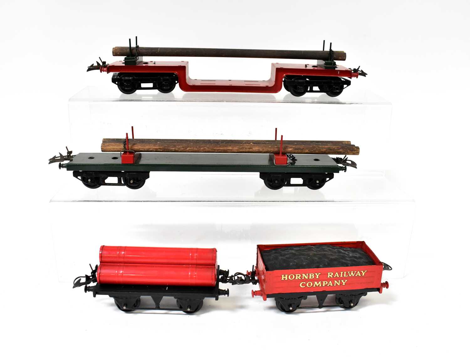 Lot 379 - HORNBY; two O gauge freight wagons with logs,...