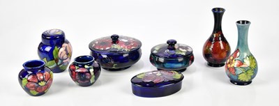 Lot 358 - MOORCROFT; a collection of eight pieces, to...