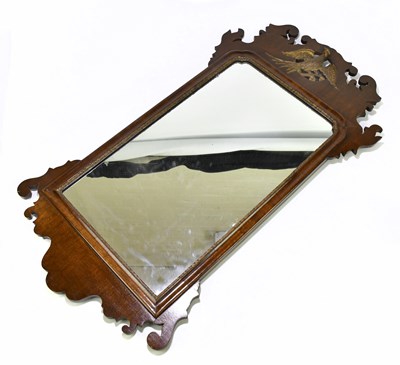 Lot 2463 - A Georgian mahogany fretwork wall mirror with...