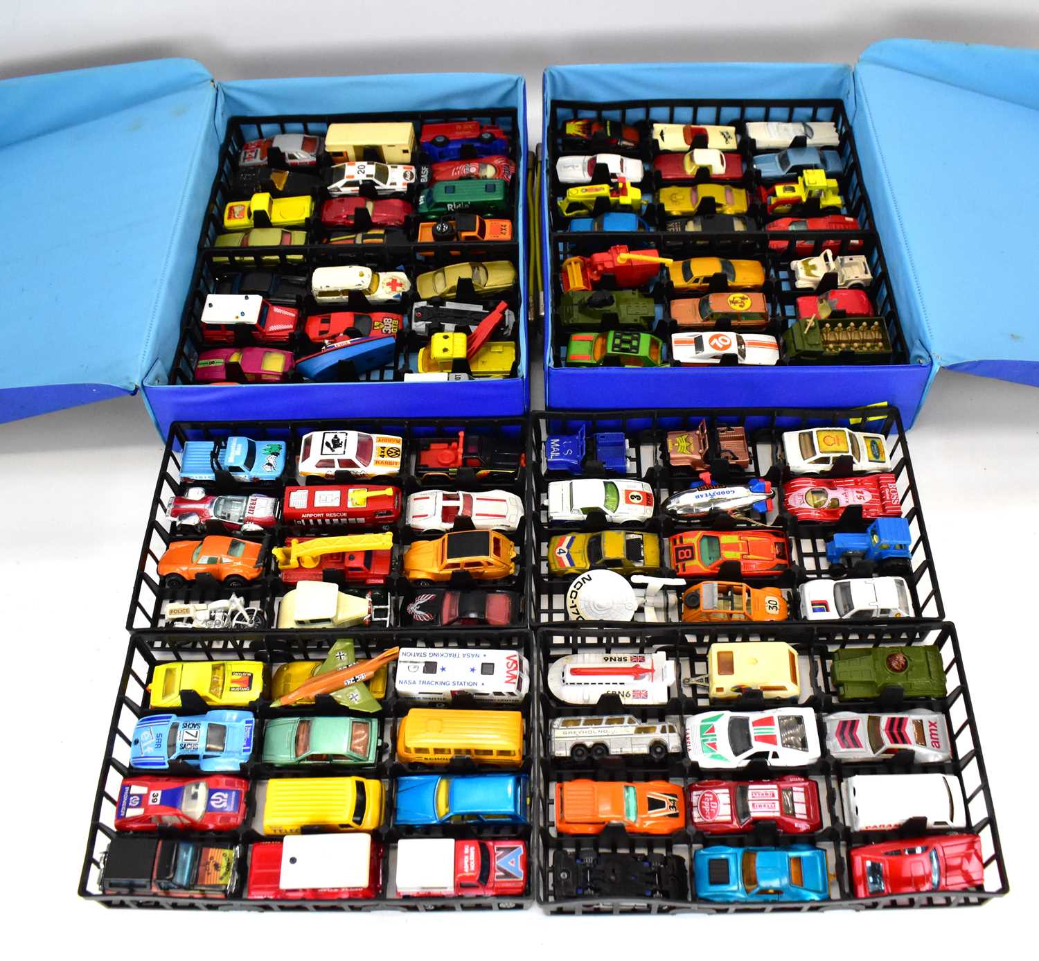 Lot 337 - MATCHBOX: two blue carry cases each with four...