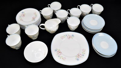 Lot 574 - SUSIE COOPER; a thirty-seven piece tea service