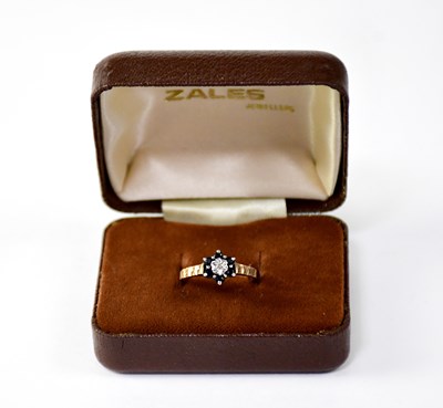 Lot 1055 - A 9ct yellow gold dress ring floral set with...