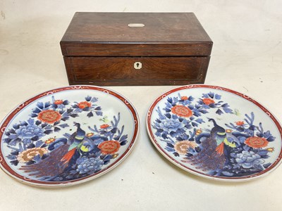 Lot 263 - A pair of Imari plates (a/f with drill holes),...