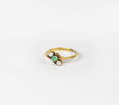 Lot 1043 - An 18ct yellow gold dress ring with small...
