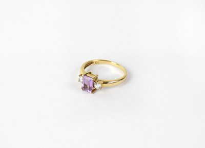 Lot 1077 - A 9ct yellow gold dress ring with emerald cut...