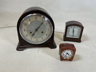 Lot 404 - A vintage bakelite Enfield mantel clock, a...