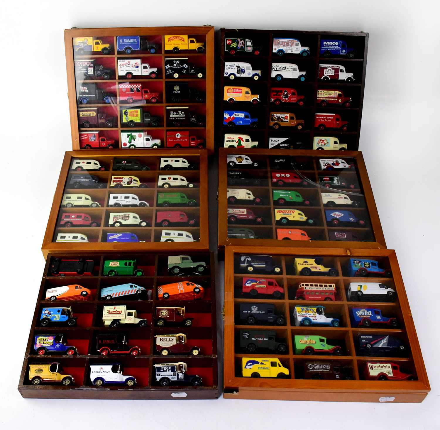 Lot 320 - Five wood and glass display cases each...