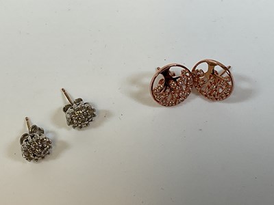 Lot 340 - A pair of 9ct gold diamond stud earrings and a...