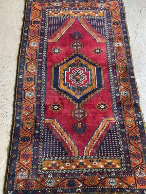 Lot 438 - A traditional Baluchi style rug, 197cm x 109cm.