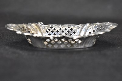 Lot 856 - An Edwardian hallmarked silver pierced dish, 2...