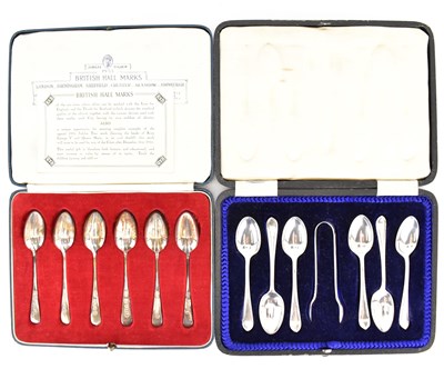 Lot 903 - Two hallmarked silver spoon sets, to include...