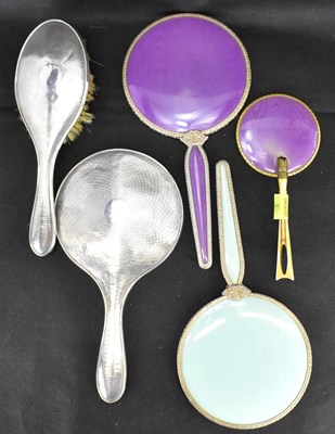 Lot 884 - A George V hallmarked silver cased dressing...