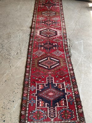 Lot 442 - A Karadja runner, 307cm x 70cm.