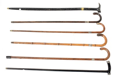 Lot 213 - Six early 20th century walking canes,...