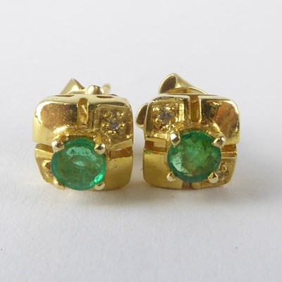 Lot 1272 - A pair of 14ct gold emerald stud earrings with...
