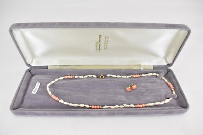 Lot 1312 - A pearl and coral necklace separated with tiny...