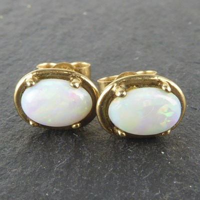 Lot 1276 - A pair of 9ct gold stud earrings, the oval...
