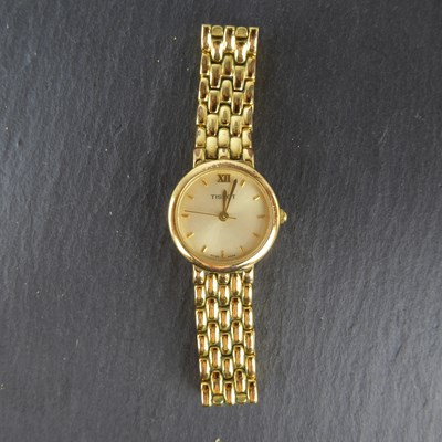 Lot 1418 - TISSOT; a ladies' gold-plated vintage...