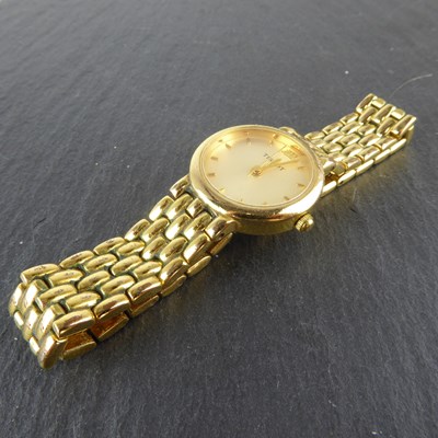 Lot 1418 - TISSOT; a ladies' gold-plated vintage...