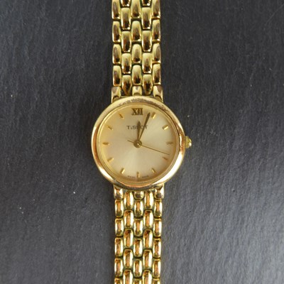 Lot 1418 - TISSOT; a ladies' gold-plated vintage...