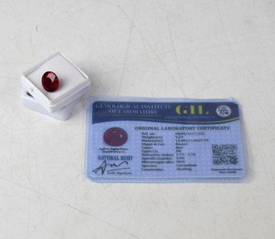 Lot 1371 - A loose 9.27 carat round ruby with GIL...