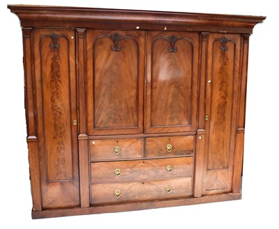 Lot 7 - A large Victorian mahogany wardrobe comprising...