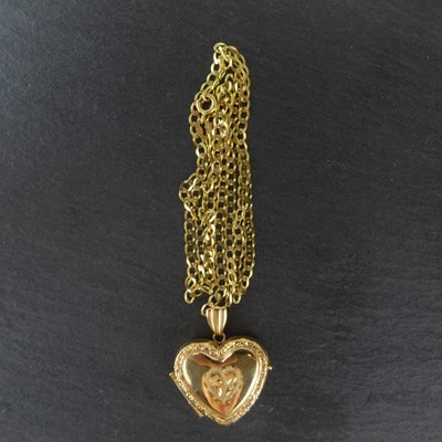 Lot 1226 - A 9ct gold heart-shaped double locket, height...